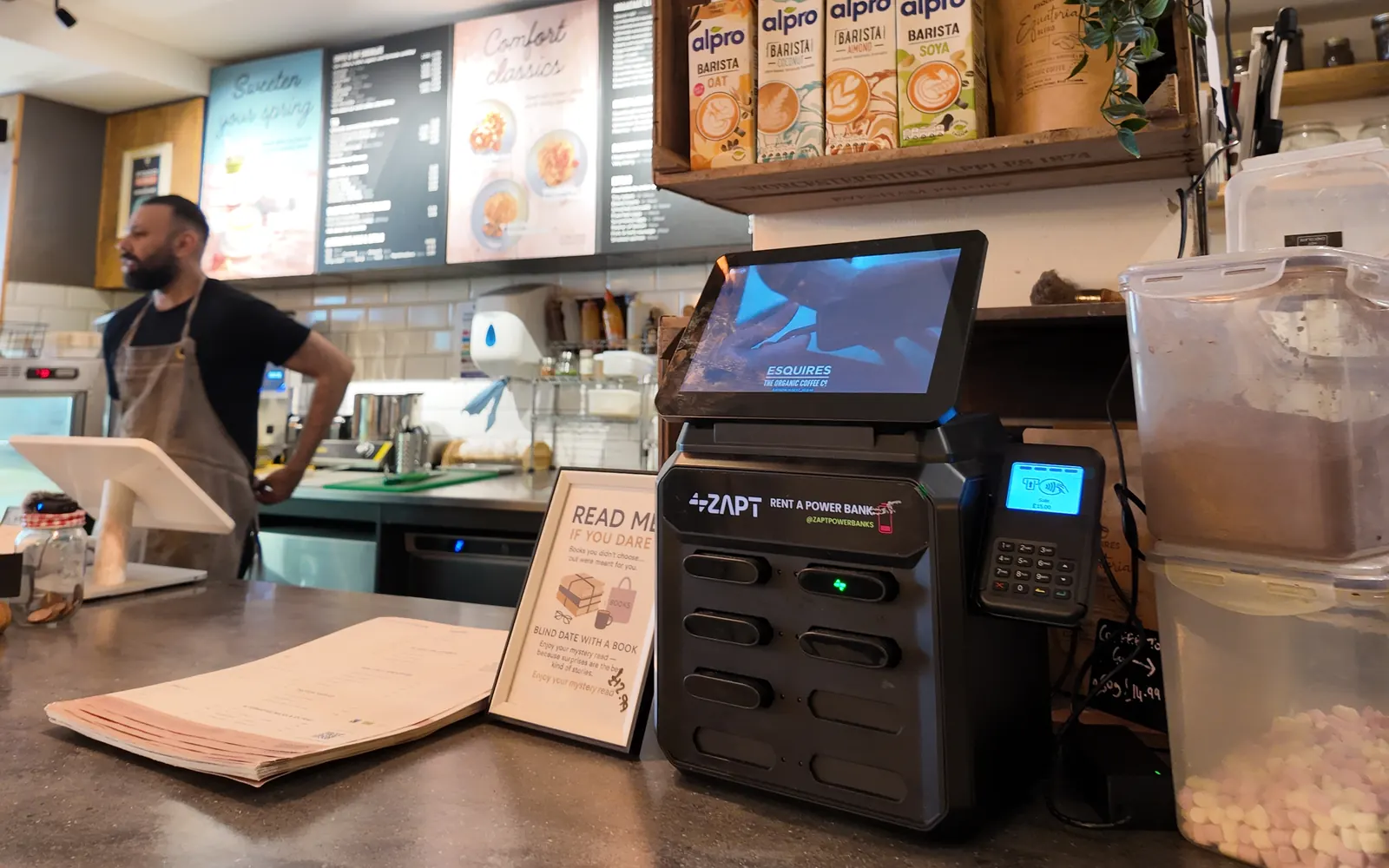 The ZAPT kiosk on the counter at Esquires Cafe